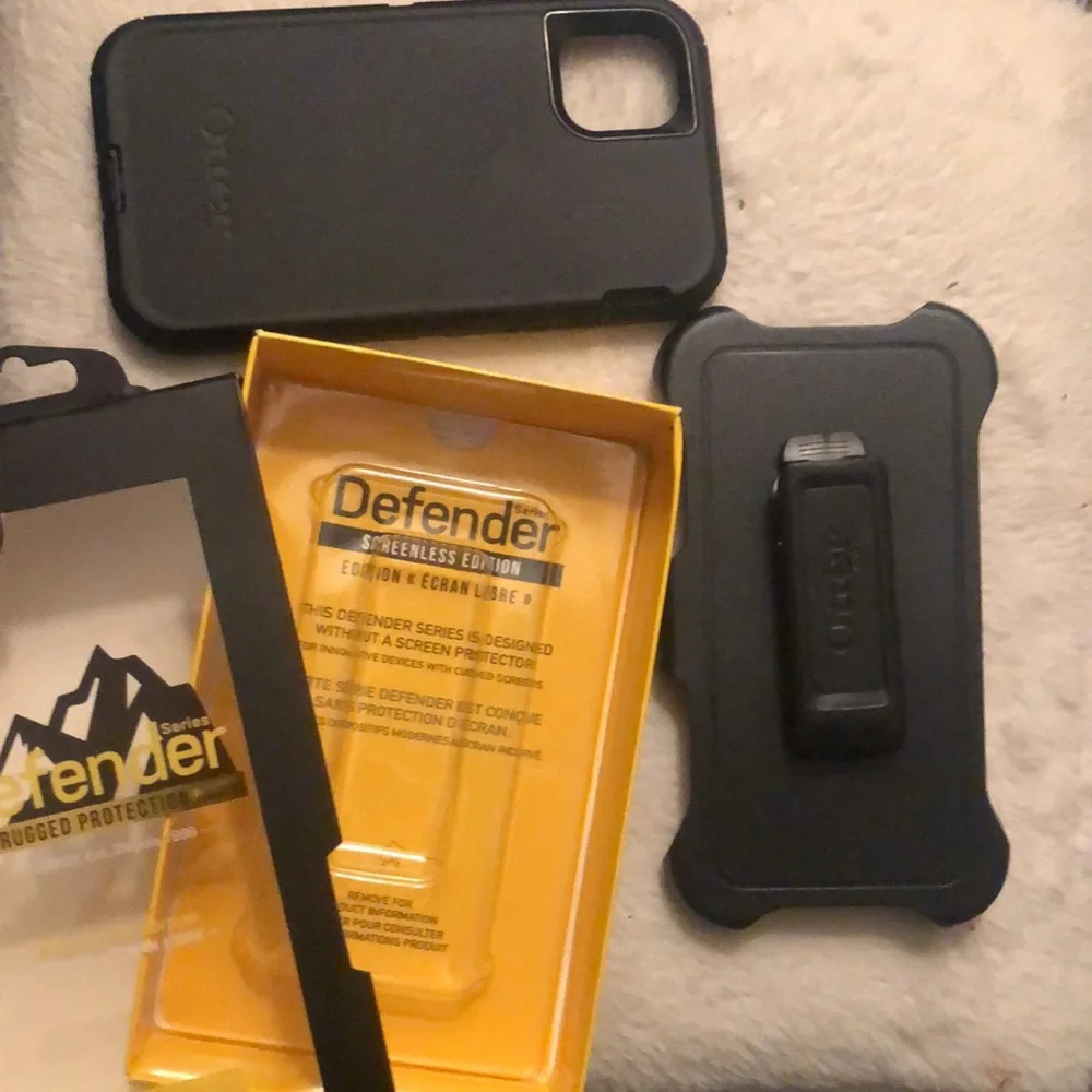 Black Otter Box Rugged Protection Defender series phone case